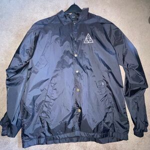 HUF 
BUTTON UP WINDBREAKER
SIZE LARGE